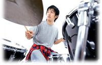 boy playing drums