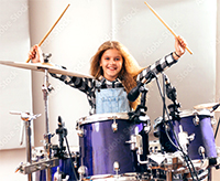 girl playing drums